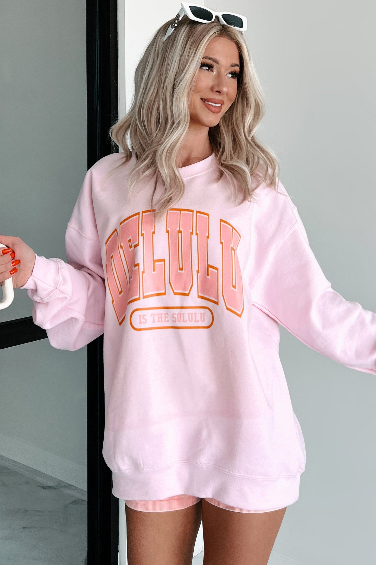"Delulu Is The Solulu" Graphic Sweatshirt (Light Pink)
