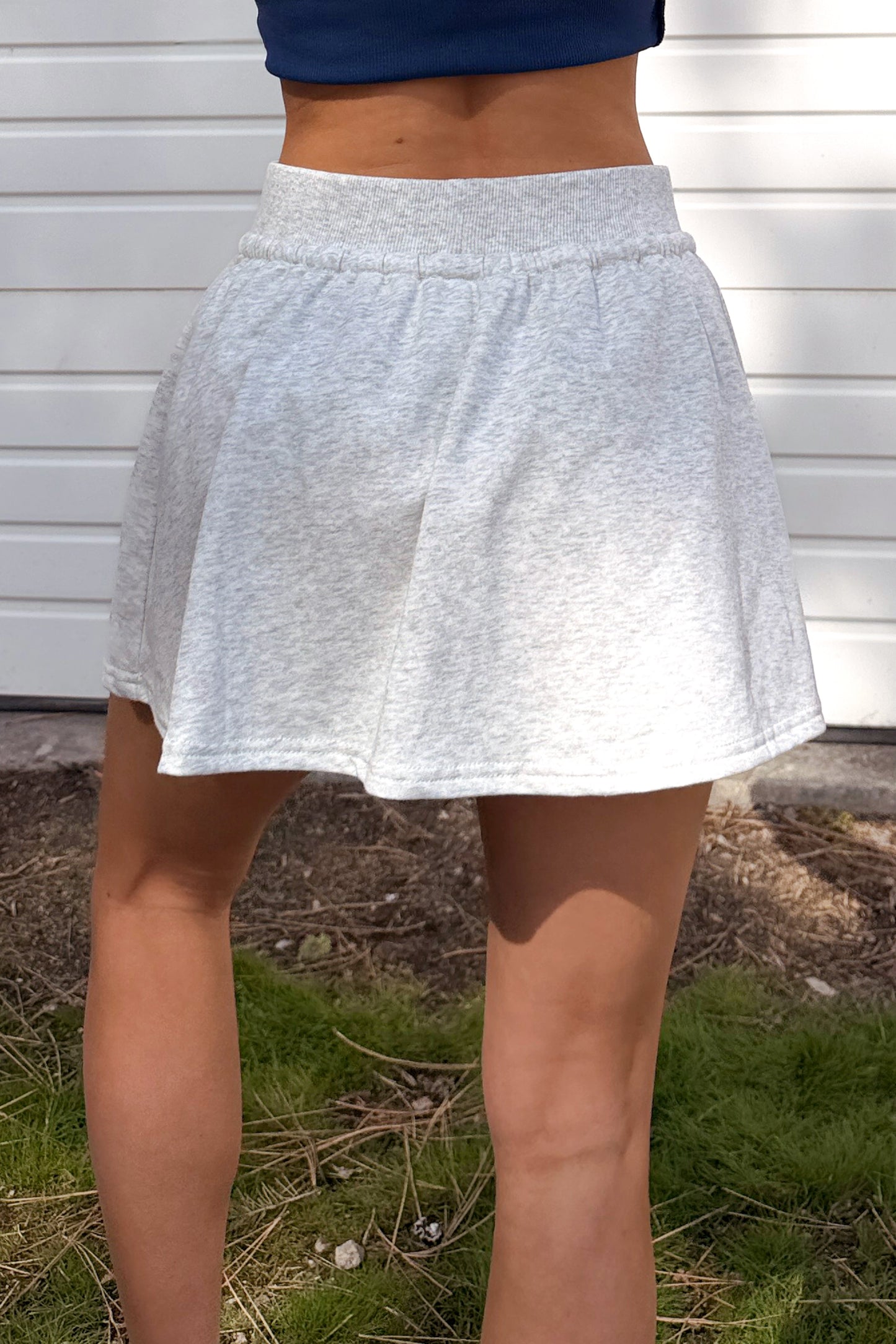 Daylight Dash Crop Top And Skort Set (White Melange)